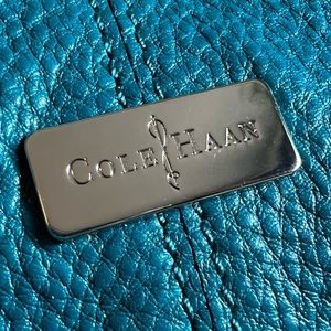 Cole Haan teal pebble leather shoulder purse.